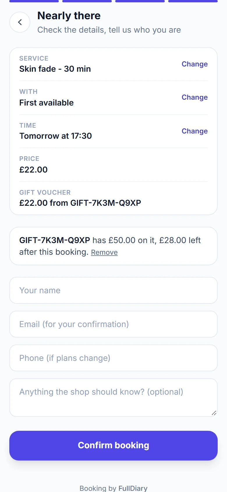 The last step of a barber's booking page on a phone: a Skin fade tomorrow at 17:30 for 22 pounds, a gift voucher row reading 22 pounds from GIFT-7K3M-Q9XP, and the voucher box saying it has 50 pounds on it with 28 pounds left after this booking